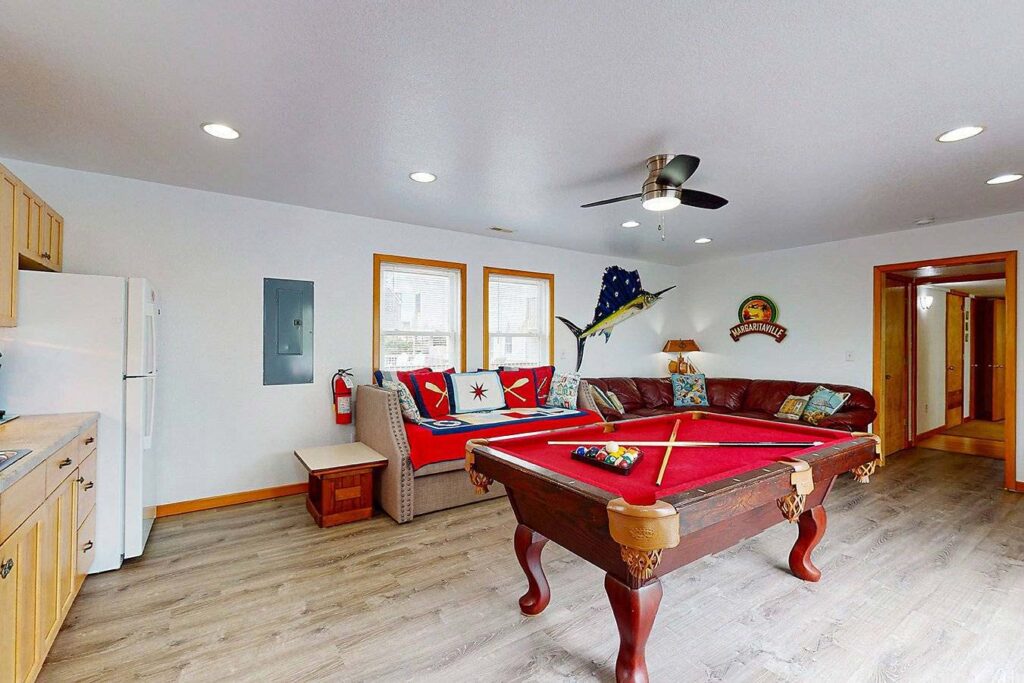 Game Room with Pool Table and Kitchen on ground level